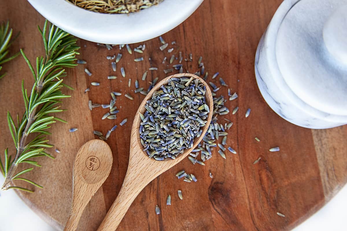 Dried lavender buds on a spoon. 