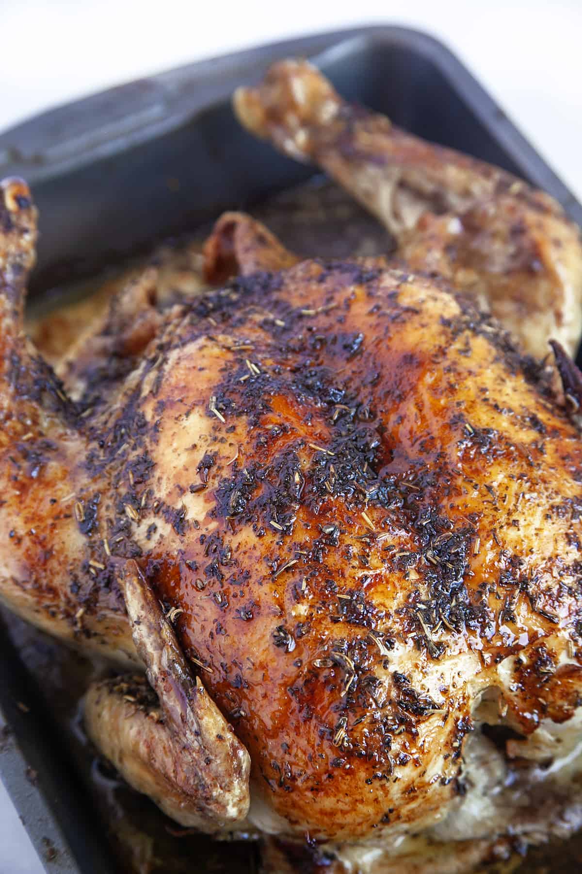 Roast chicken in a pan. 