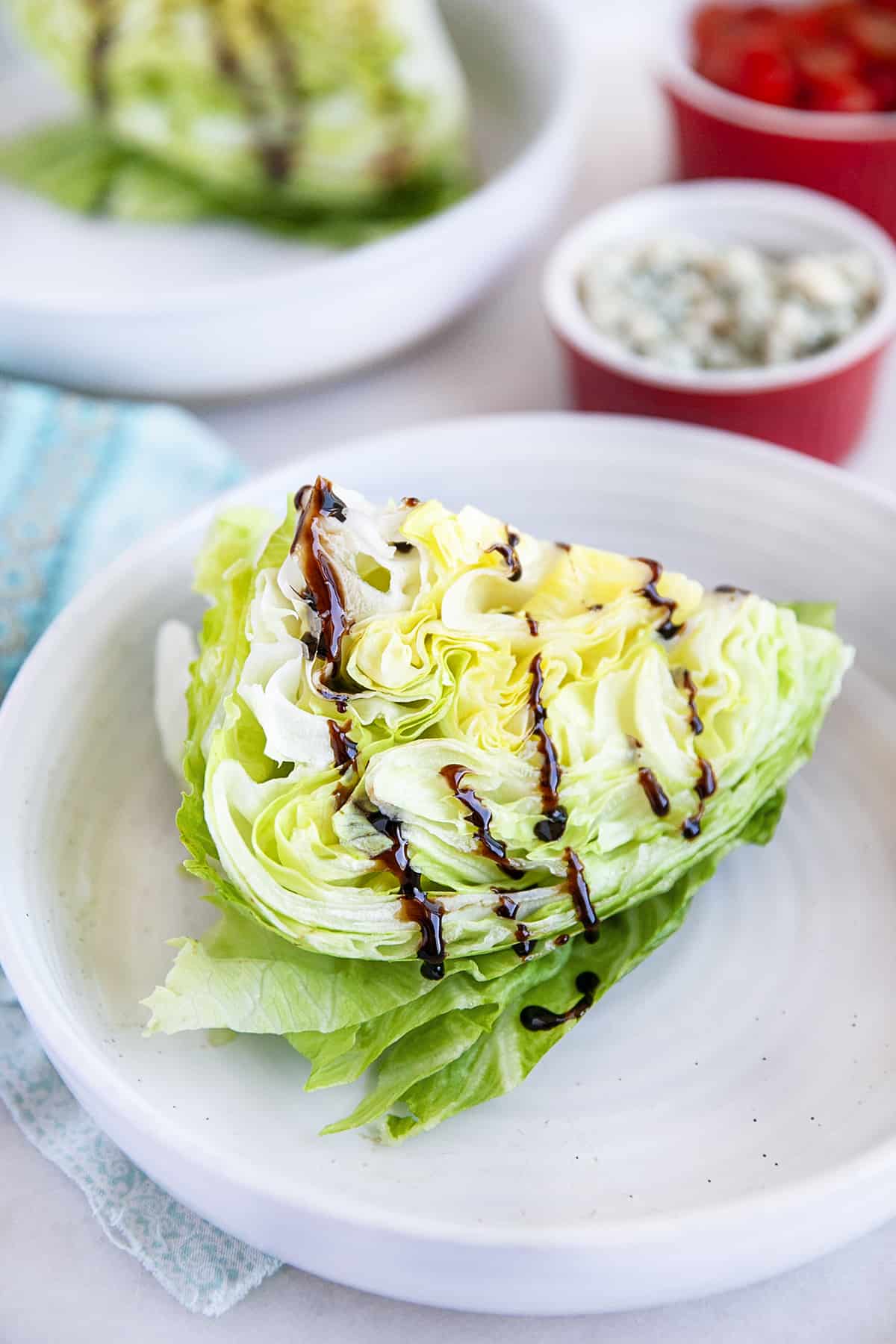Lettuce drizzled with balsamic vinegar reduction. 