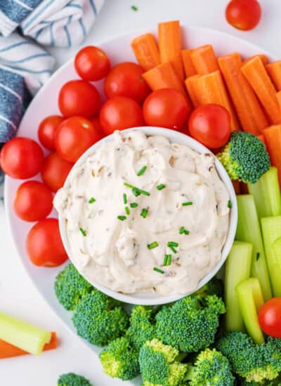 Platter of veggies with a bowl of French Onion Dip