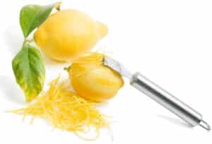 Lemon Getting Zested How to Zest a Lemon - Noshing With The Nolands