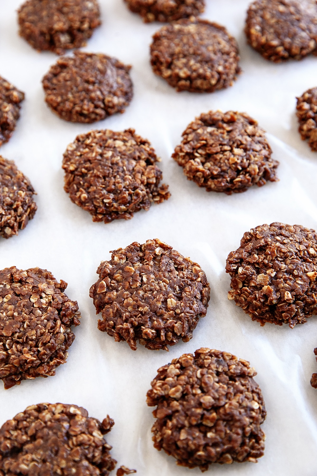 Chocolate No-Bake Cookies on parchment paper. 