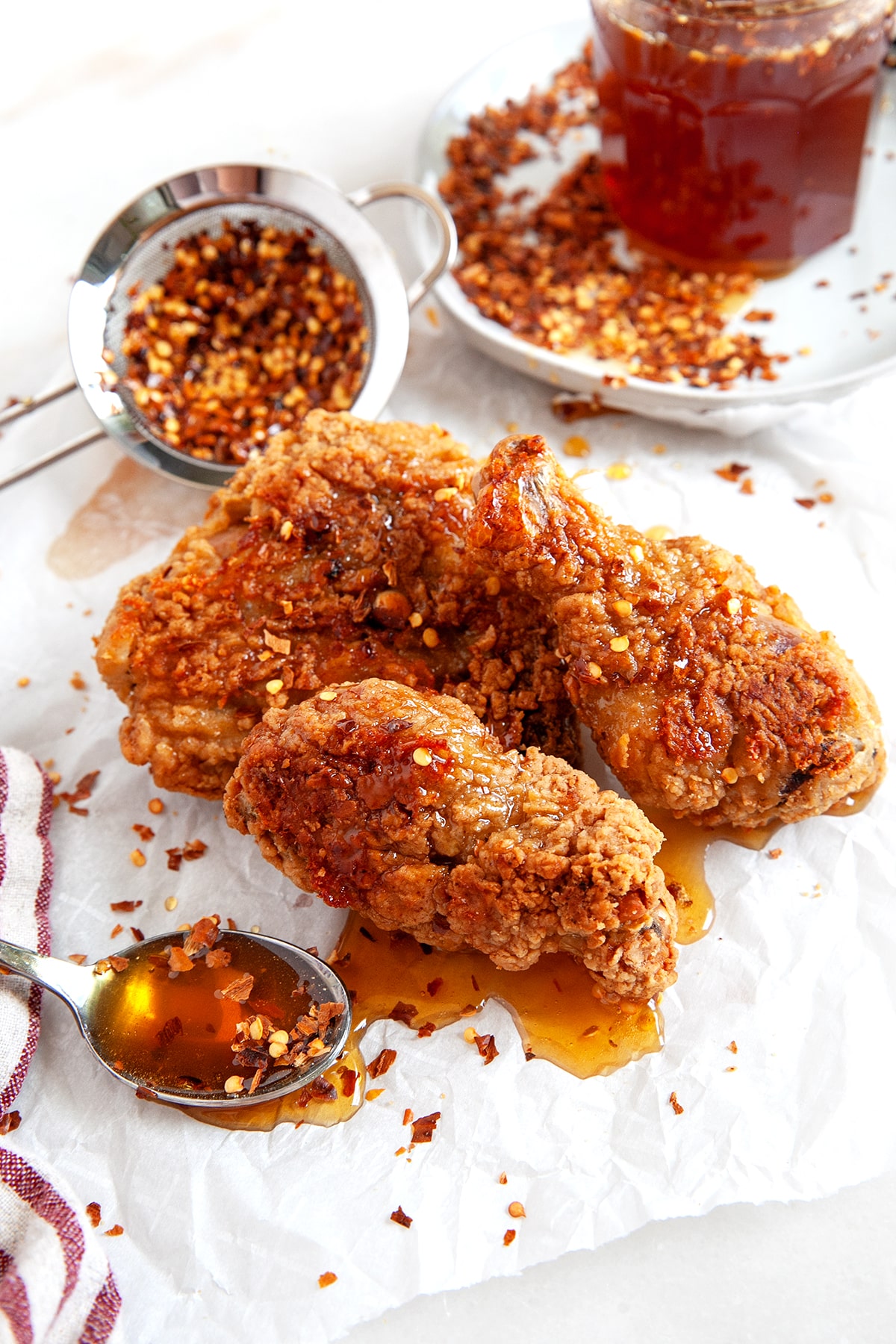Fried chicken with hot honey drizzled on top. 