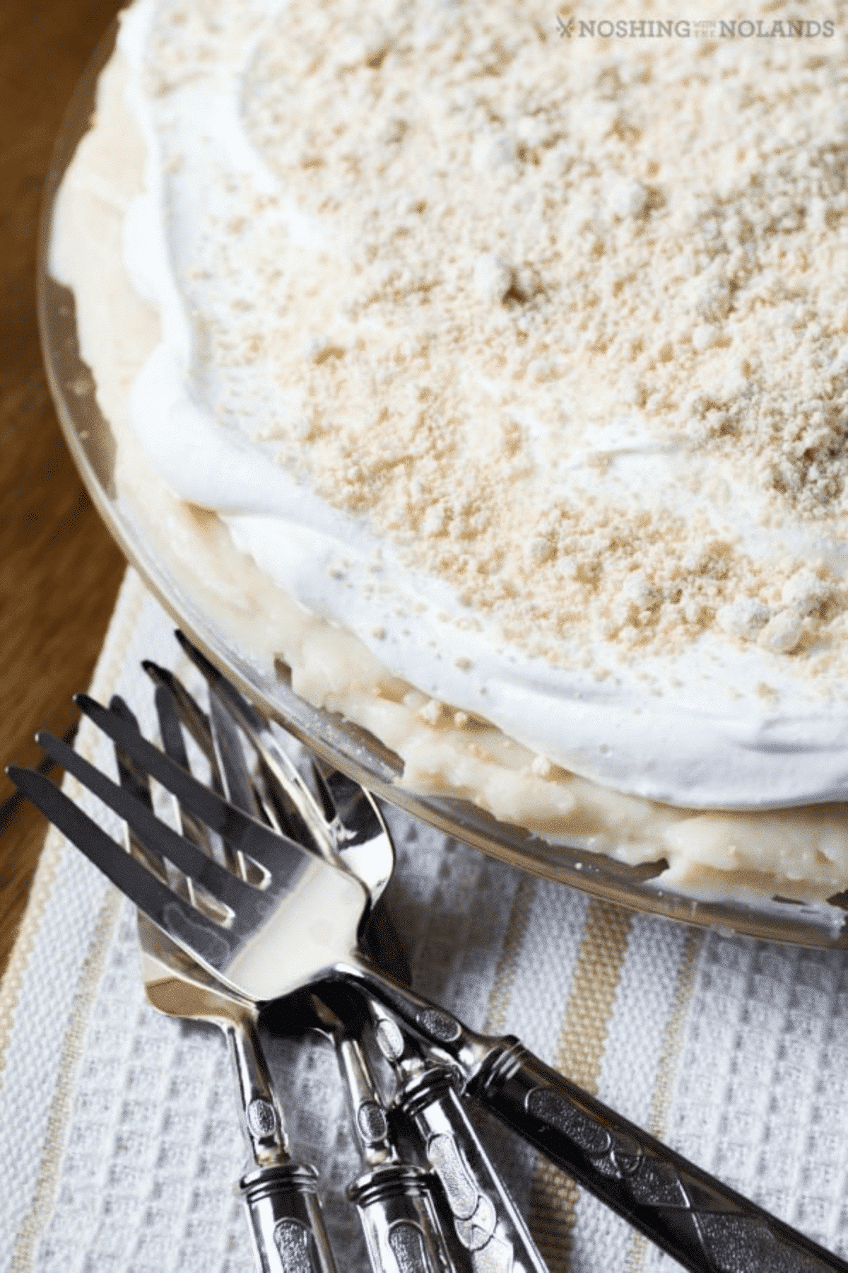 Amish Peanut Butter Pie in a pan with forks. 