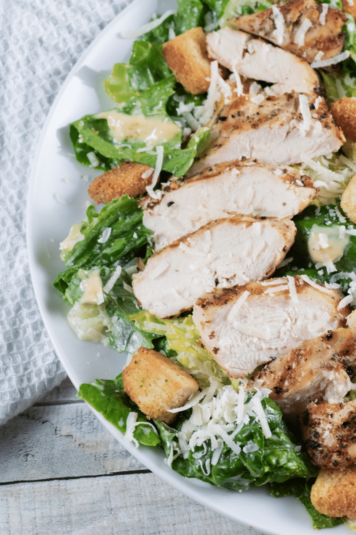 Grilled Chicken Caesar Salad on a plate. 