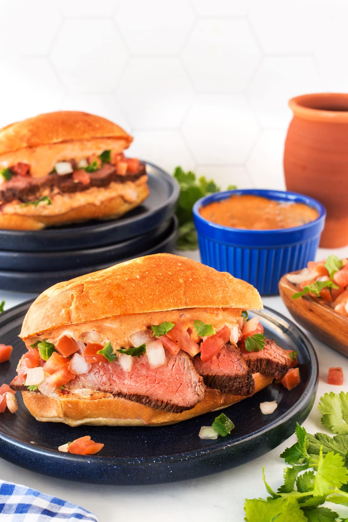 Grilled Tri-Tip Sandwich on a blue plate. 