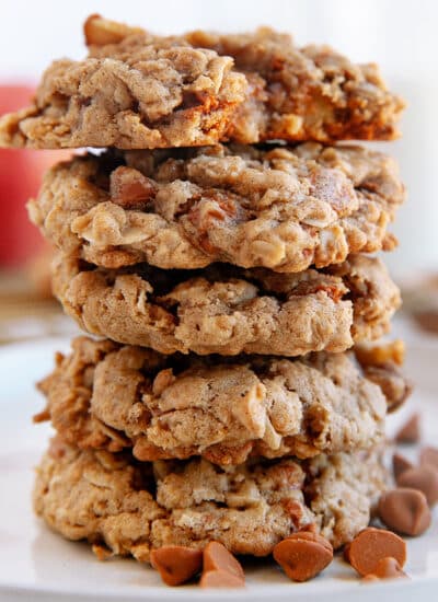 Apple Oatmeal Cookies stacked on a plate.