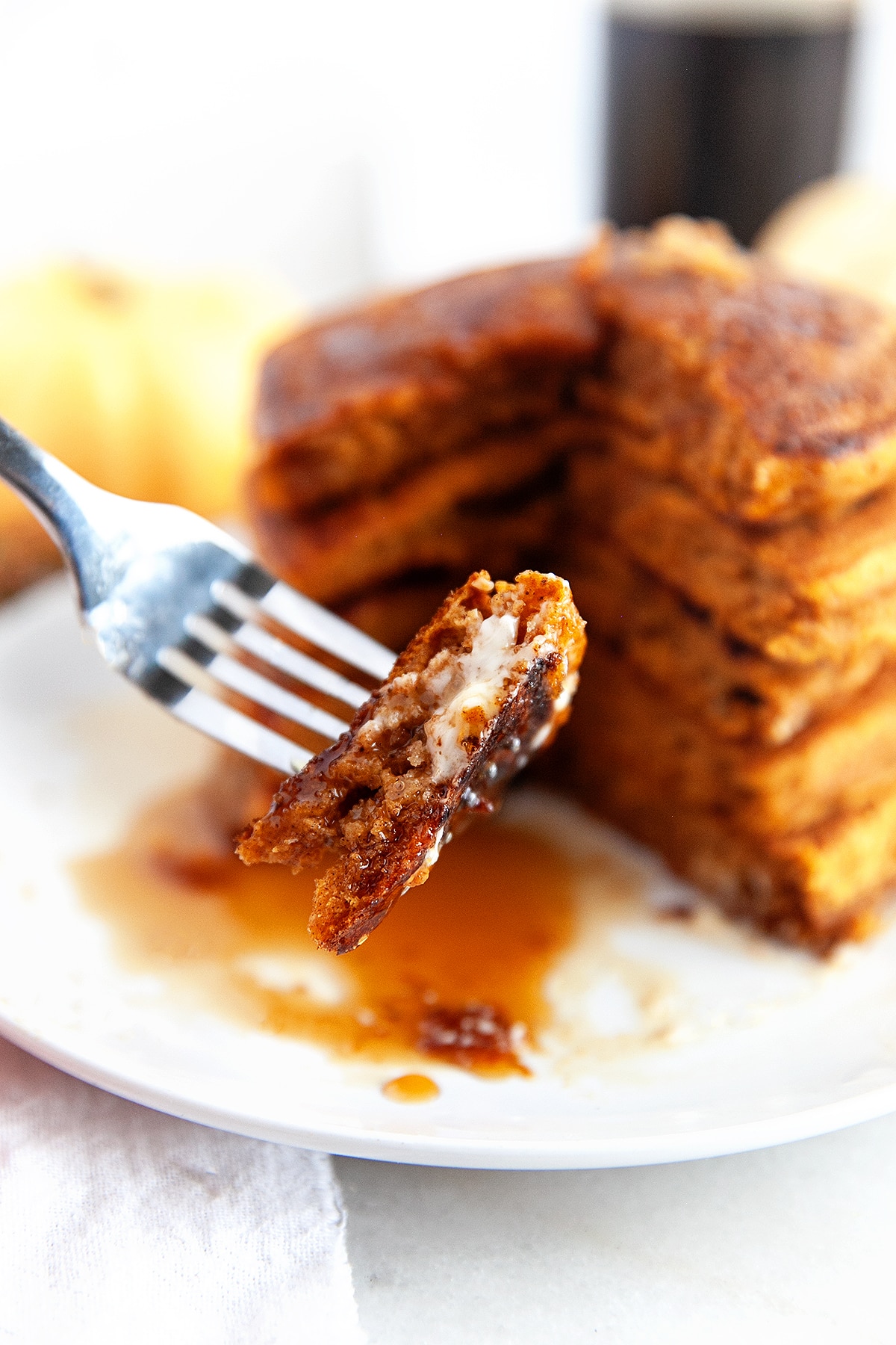 Showing a bite of pancake on a fork. 