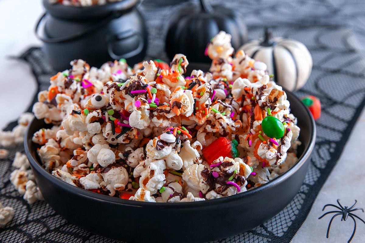 Horizontal shot of a bowl of Halloween popcorn. 