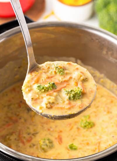 Ladle of broccoli cheese soup.