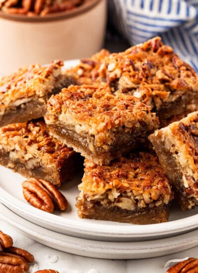 Chewy Pecan Bars on a serving plate.