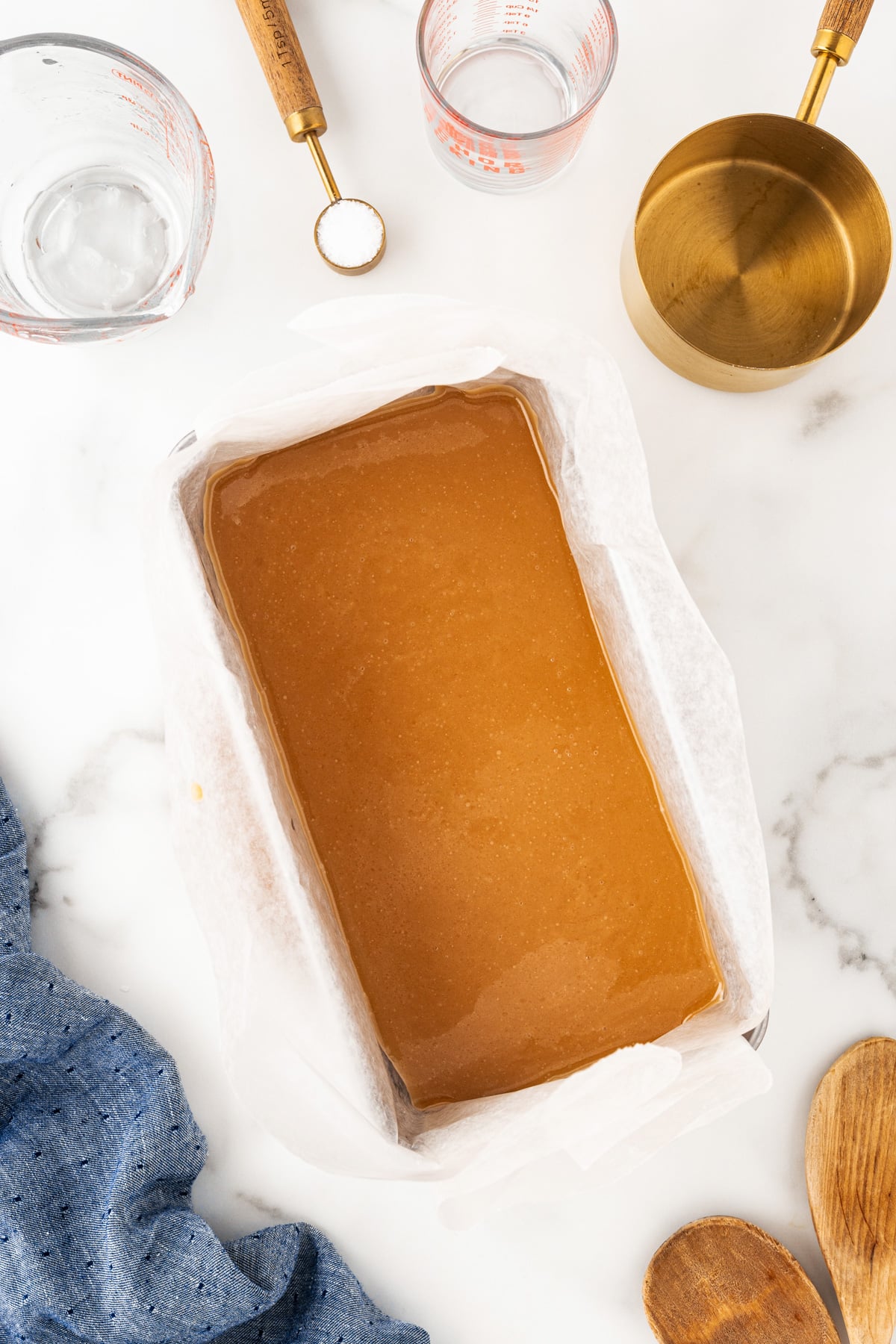Caramel poured in a loaf pan. 