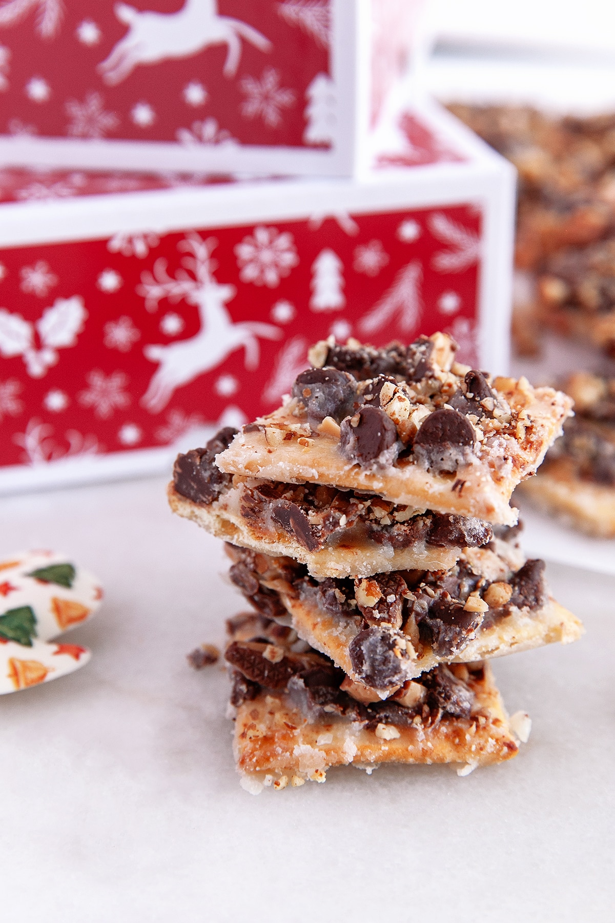 Stacked pieces of Saltine Toffee. 