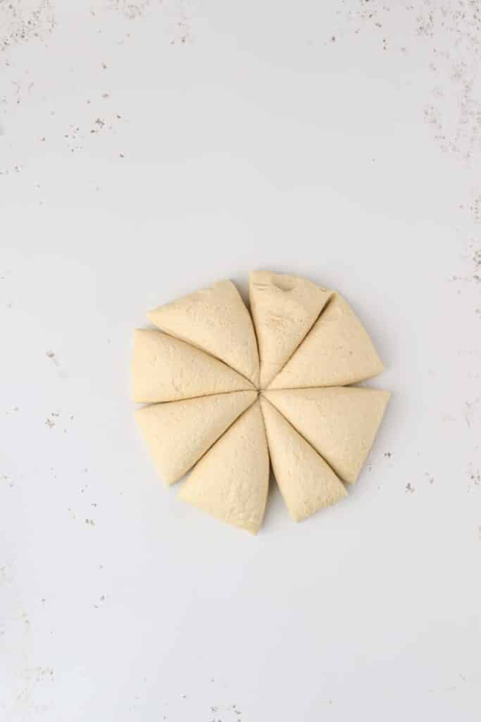 Dough cut into triangles. 