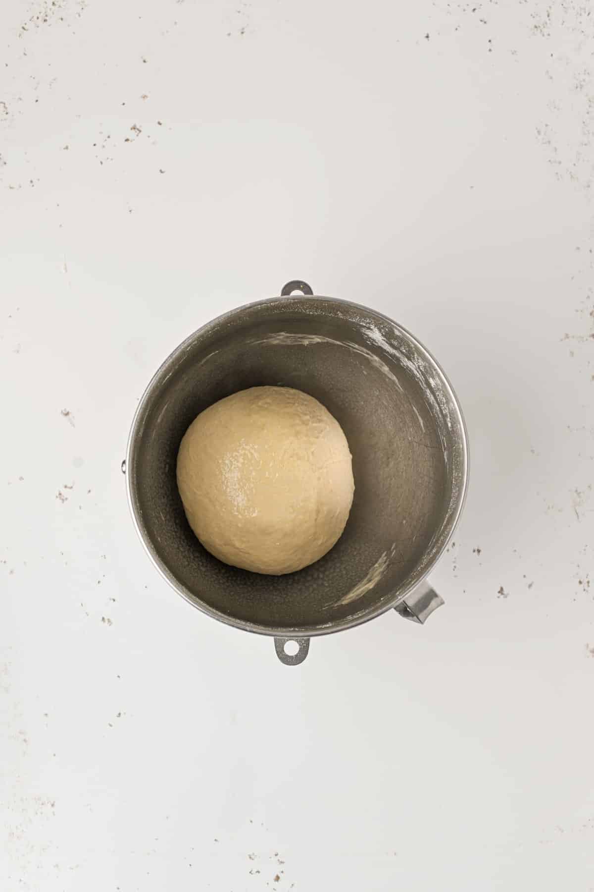 Dough in a greased bowl. 