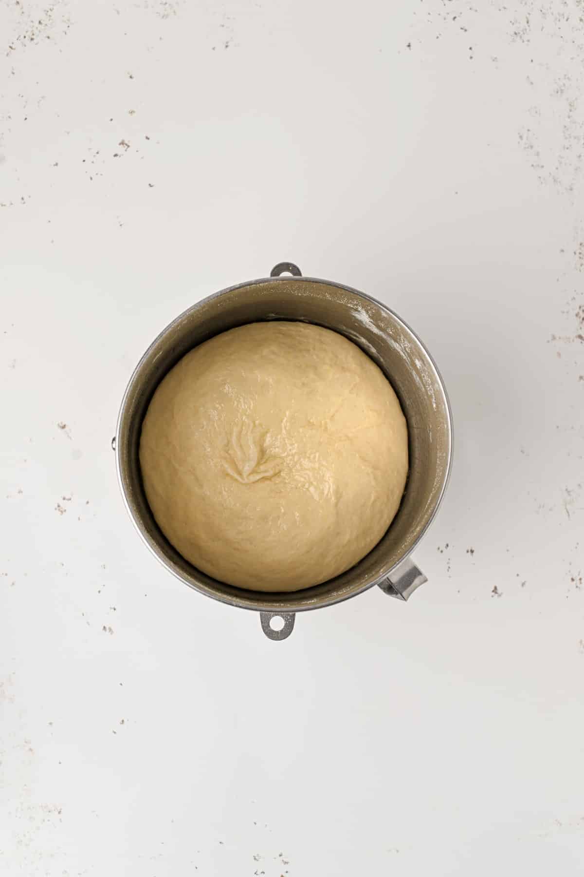Dough risen in a bowl. 