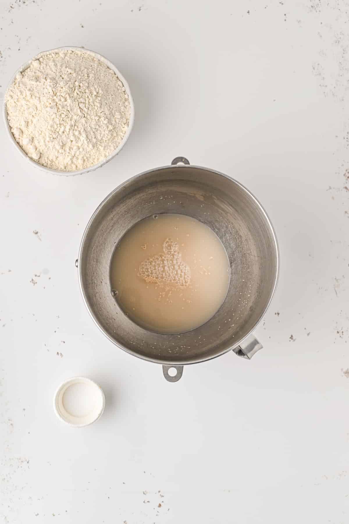 Yeast, water and sugar in a bowl. 