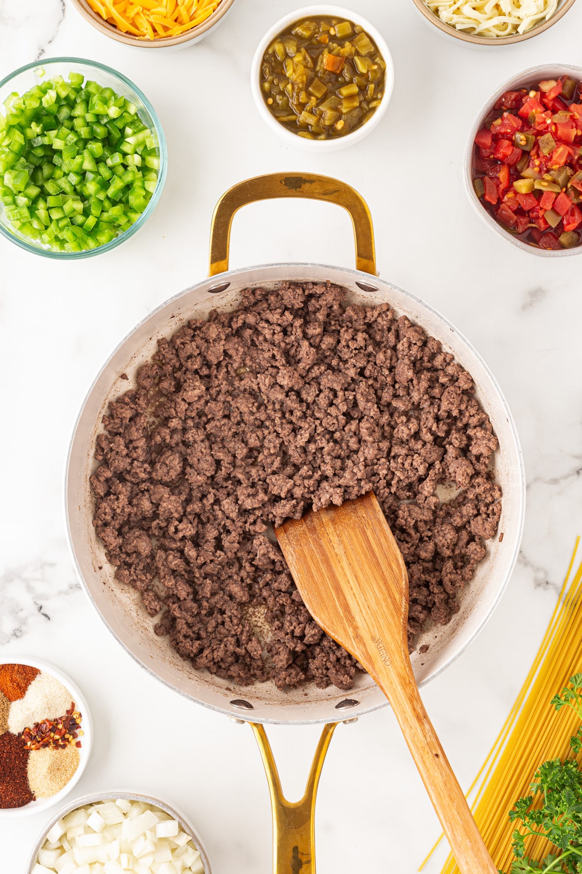 Cooked ground beef in a skillet. 