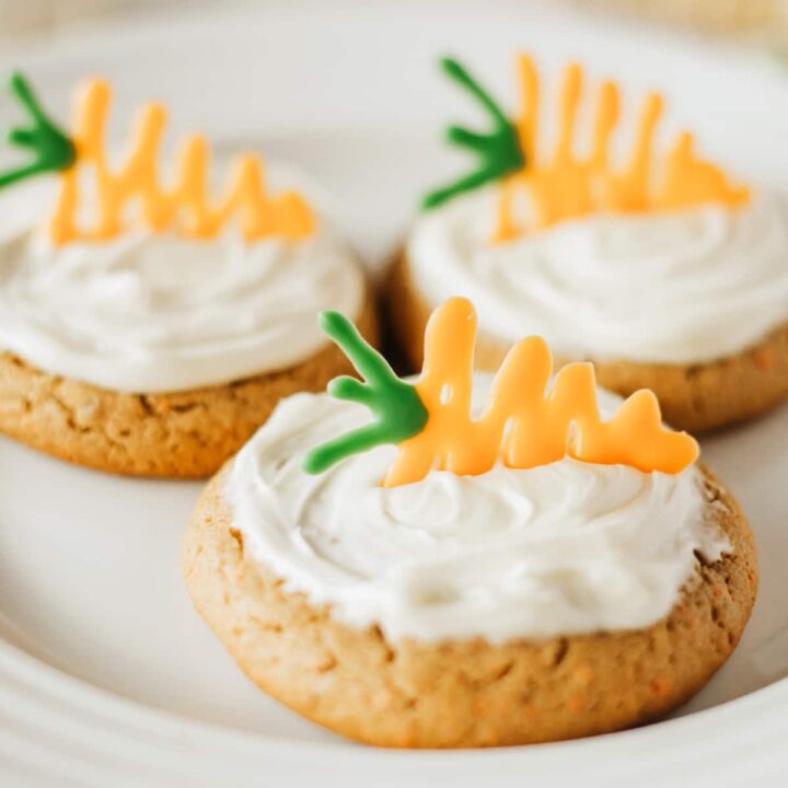 Carrot cake cookies on a plate.