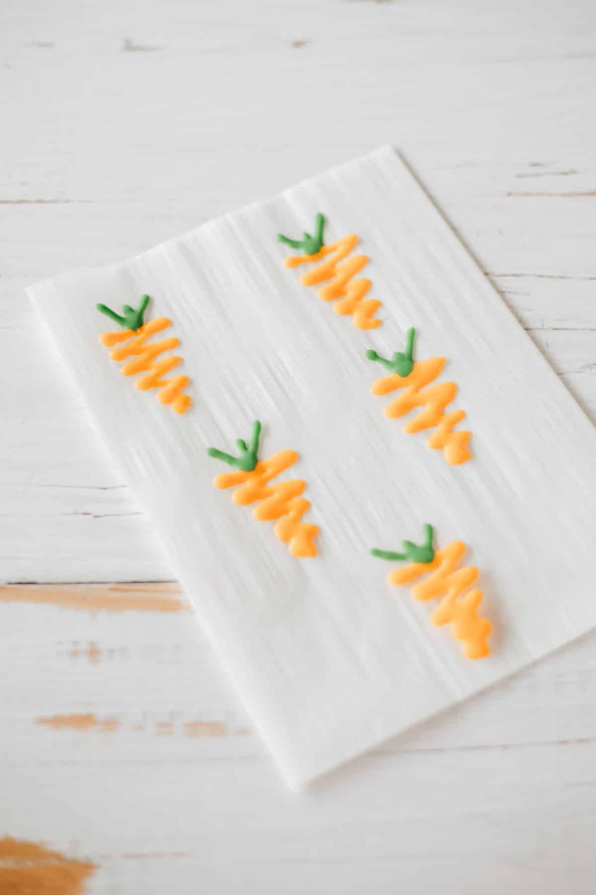 Candy carrot on parchment. 
