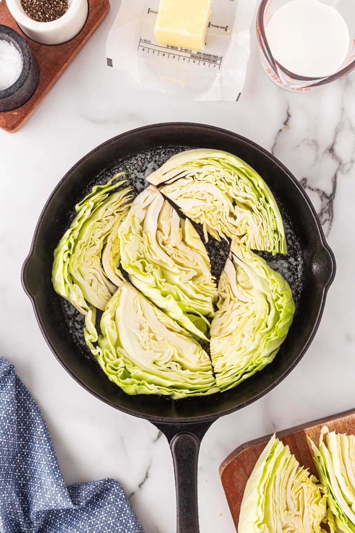 Cabbage wedges in a cast iron pan. 