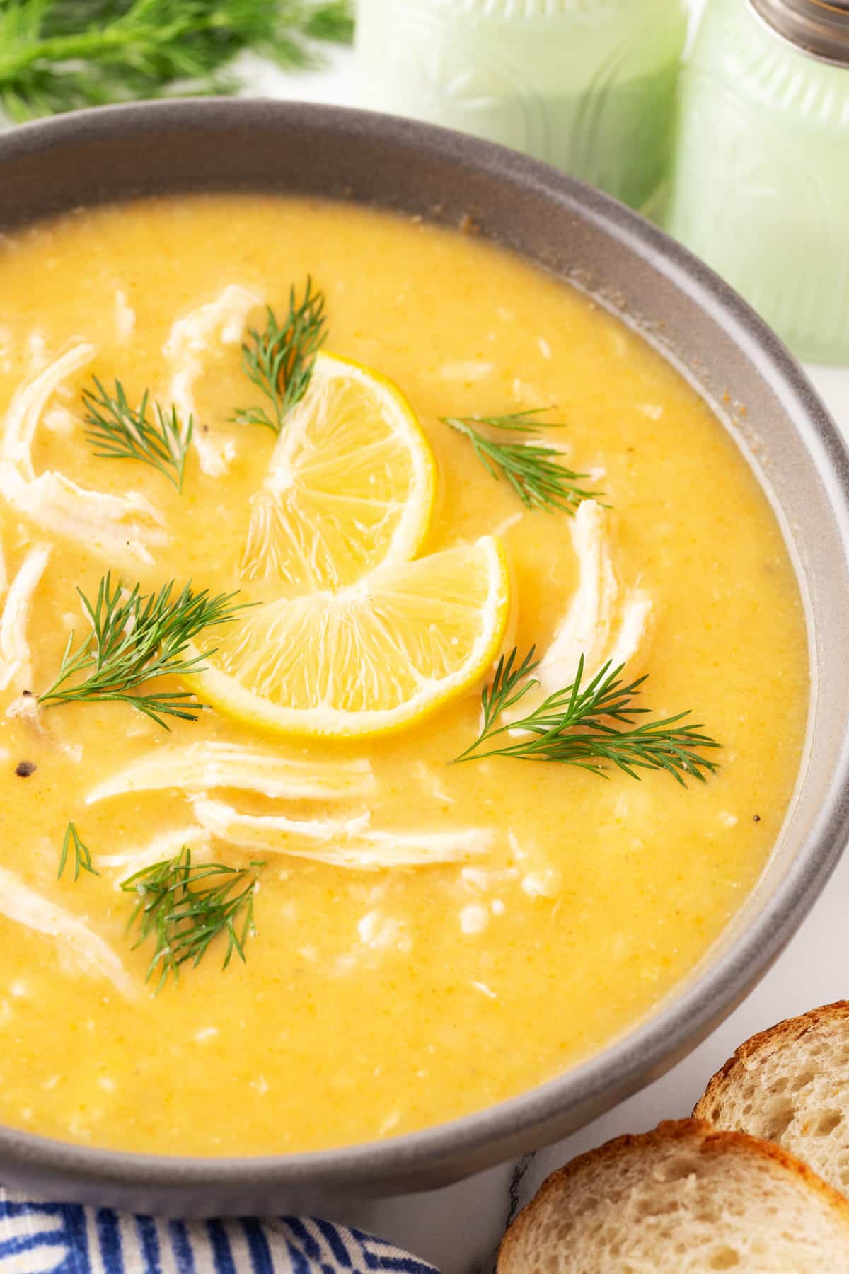 Close-up of a bowl of Avgolemono Soup - Greek Lemon Chicken Soup. 