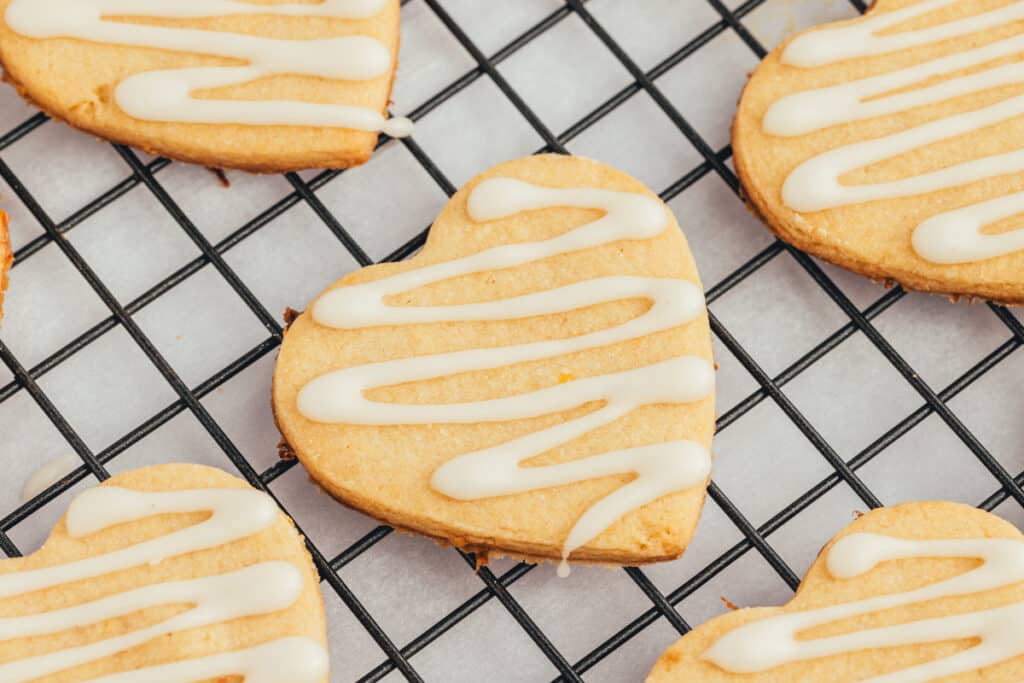 Horizontal picture of Lemon Shortbread Cookies on a cooling rack. 