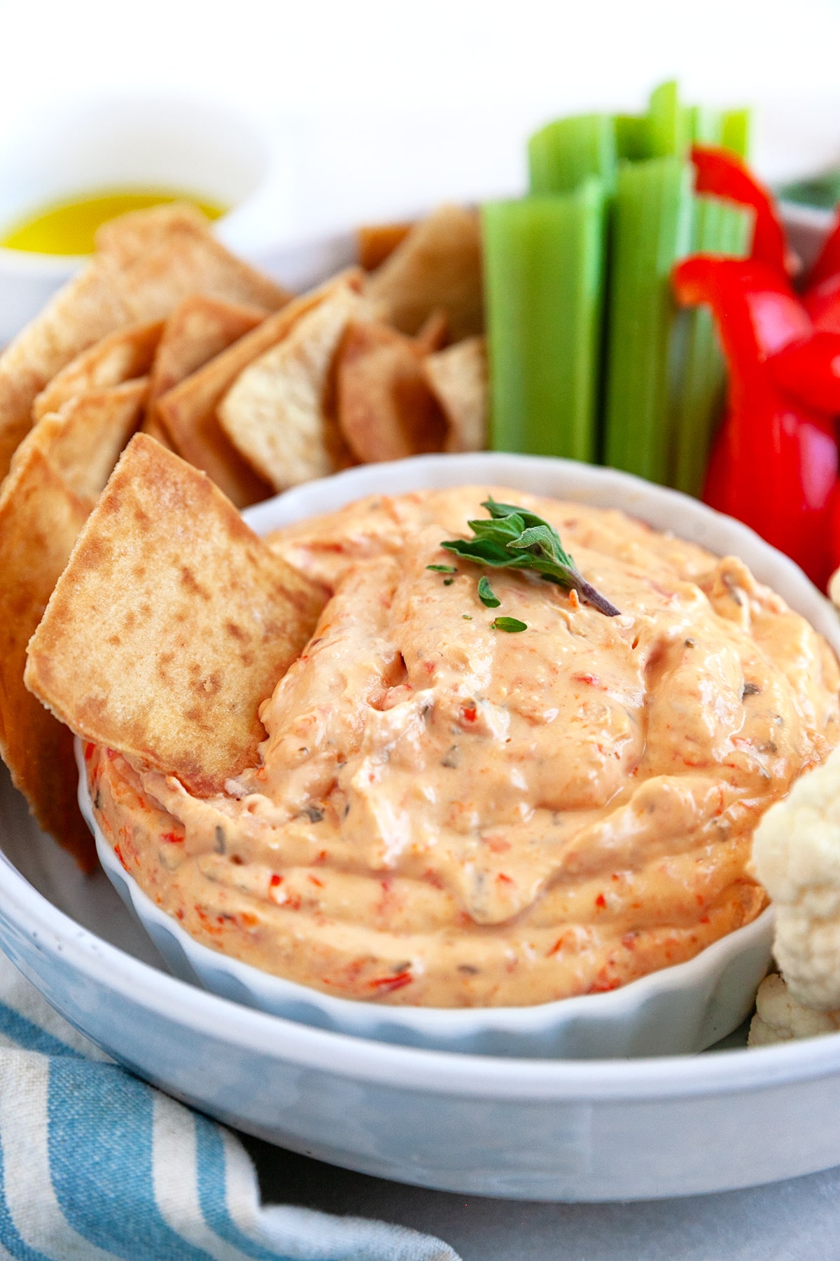Feta Roasted Red Pepper Dip with pita chips and veggies. 