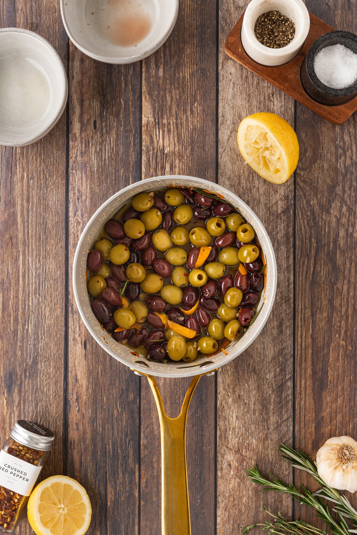 Finished olives in a pot.