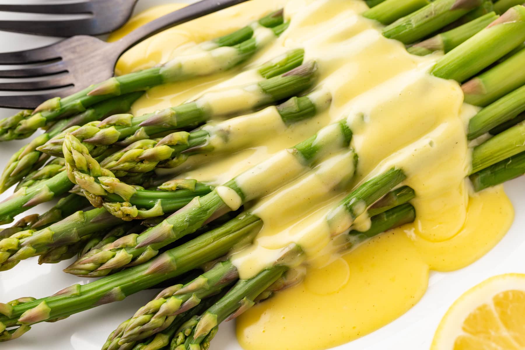 Horizontal photo of Asparagus with Hollandaise Sauce. 