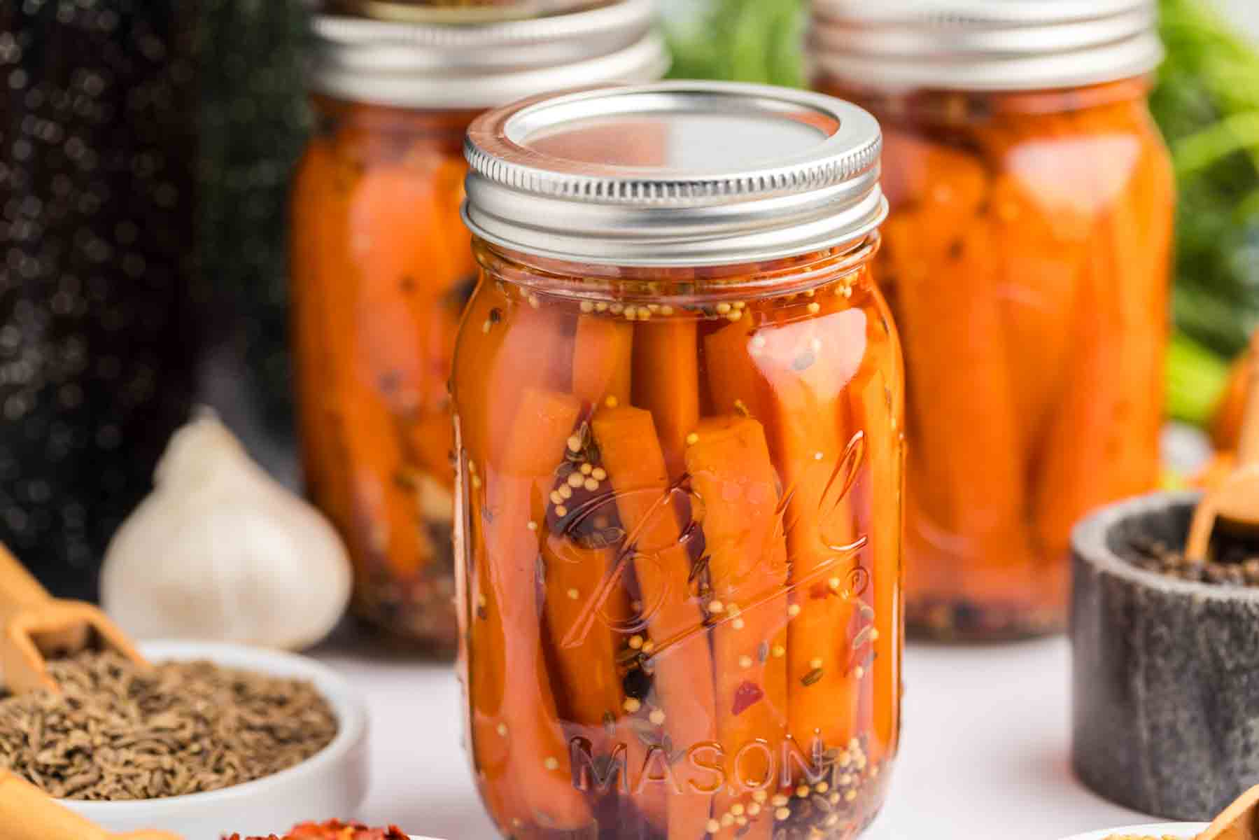 Horizontal picture of a jar of carrots. 
