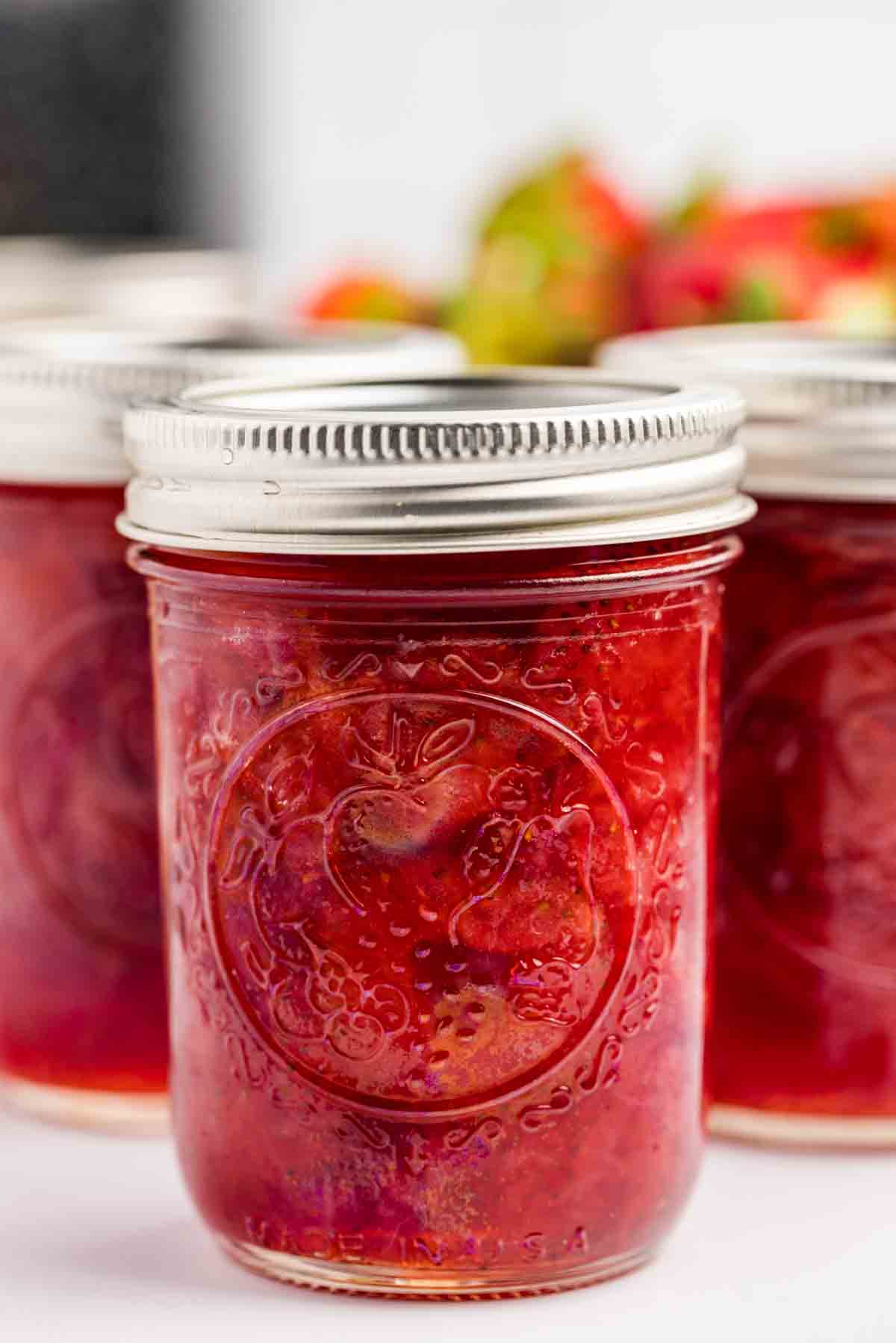 Small Batch Strawberry Jam in jars close-up. 