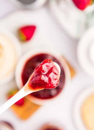 Strawberry Jam on a spoon from overhead.