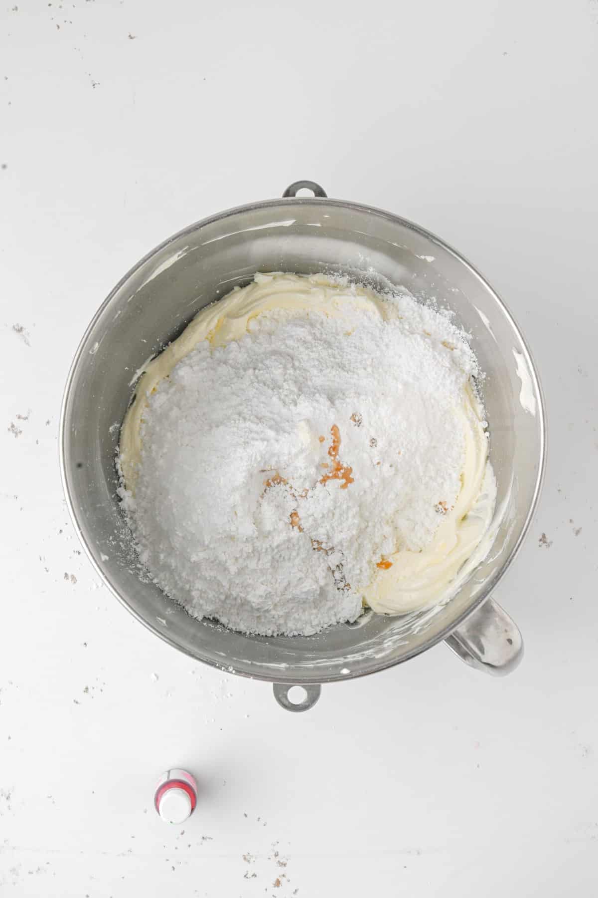 Powdered sugar and vanilla added to creamed butter. 