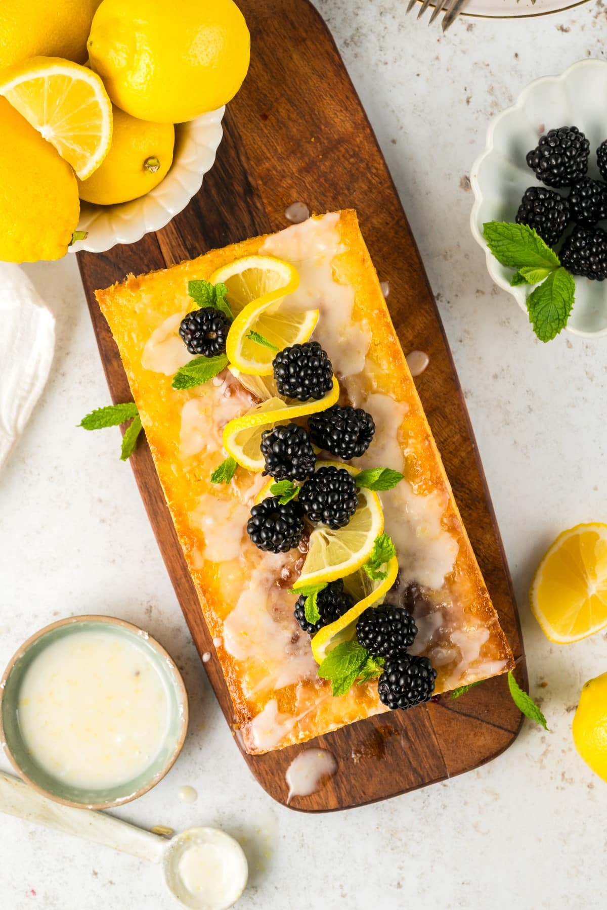 Fully decorated with lemon and blackberries. 