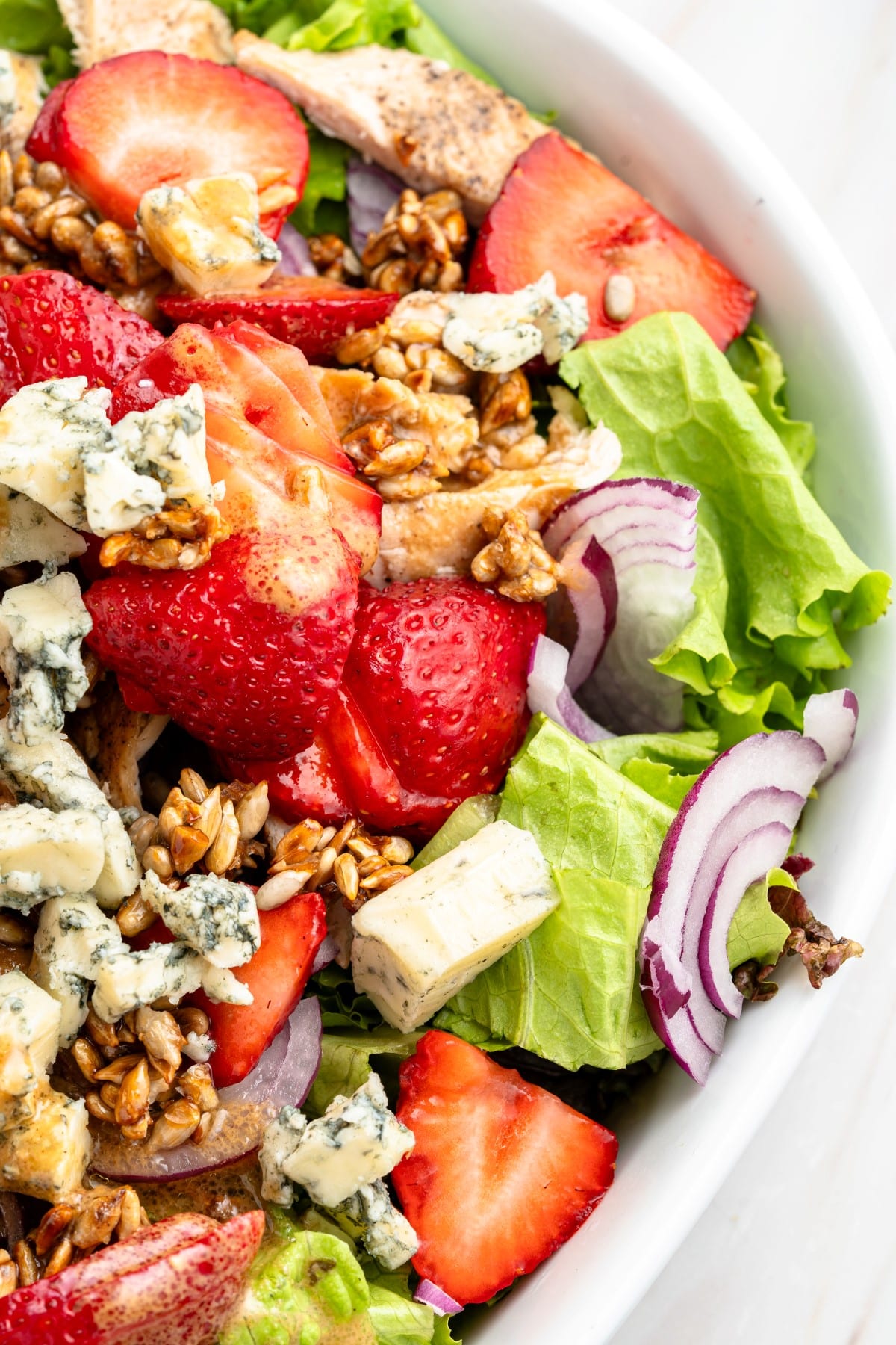 Close-up photo of Strawberry Chicken Salad with dressing. 