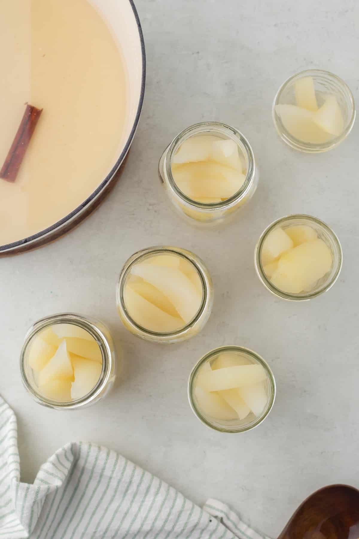 Jars of pears with no lids. 