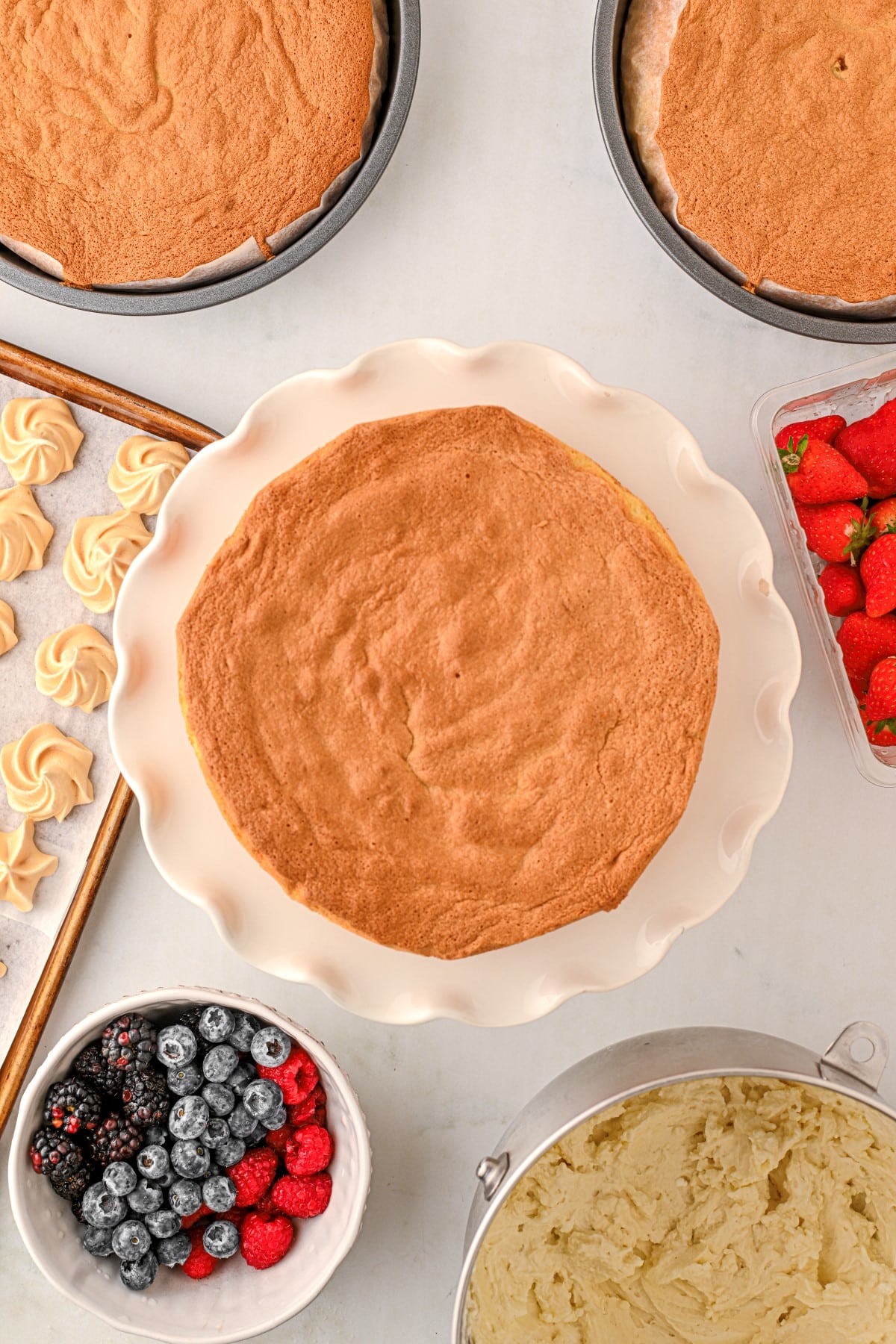 First cake layer added to the cake stand. 