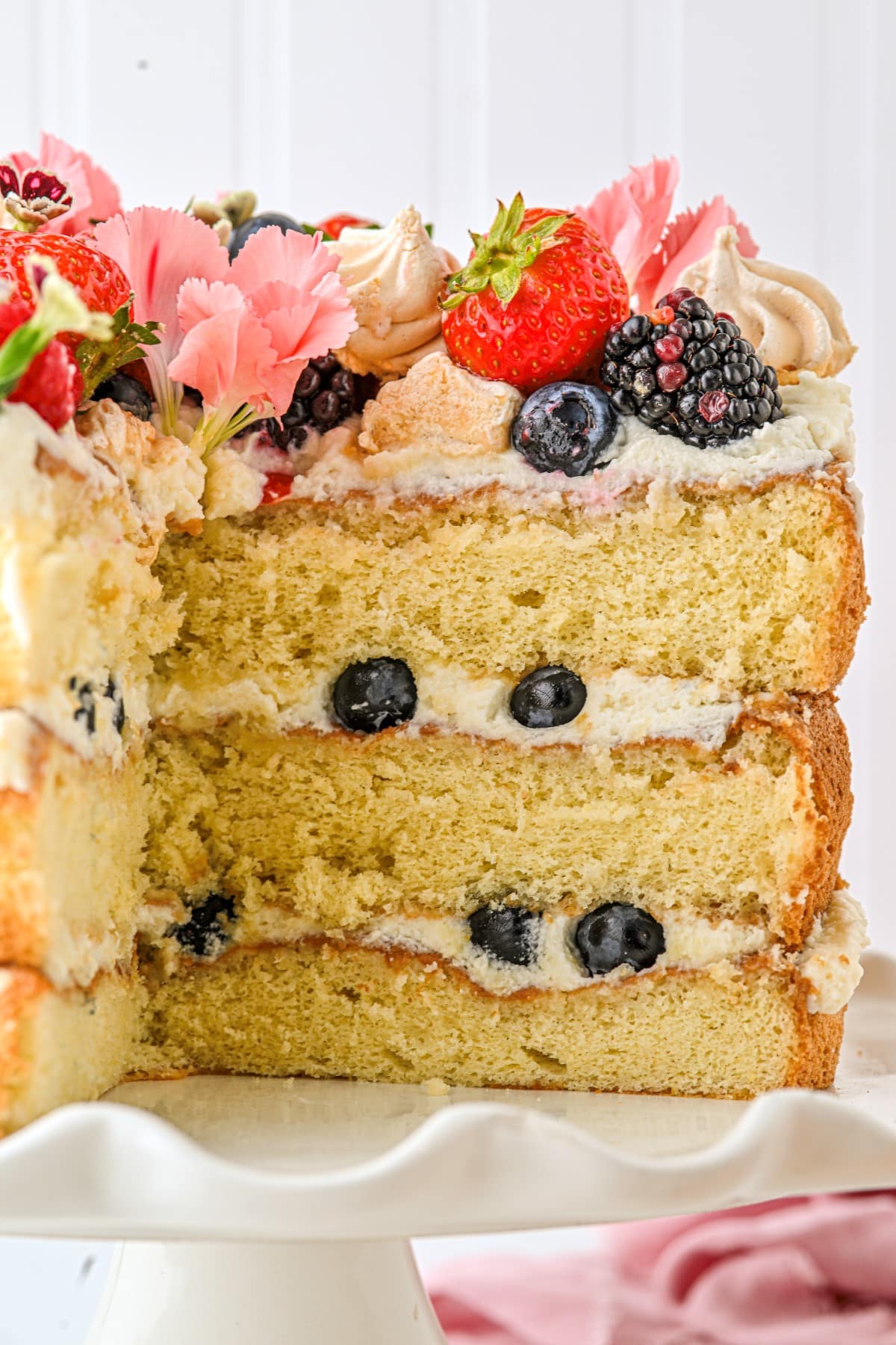 Showing the cake sliced up close. 