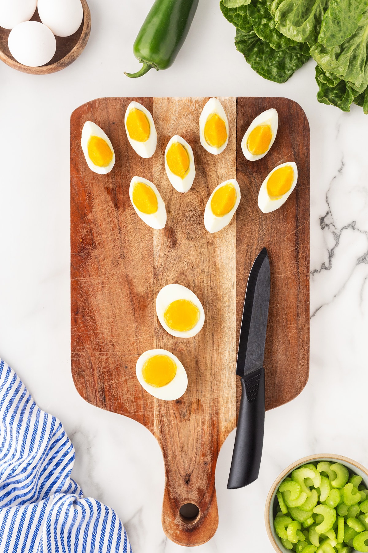 Slicing eggs into quarters. 