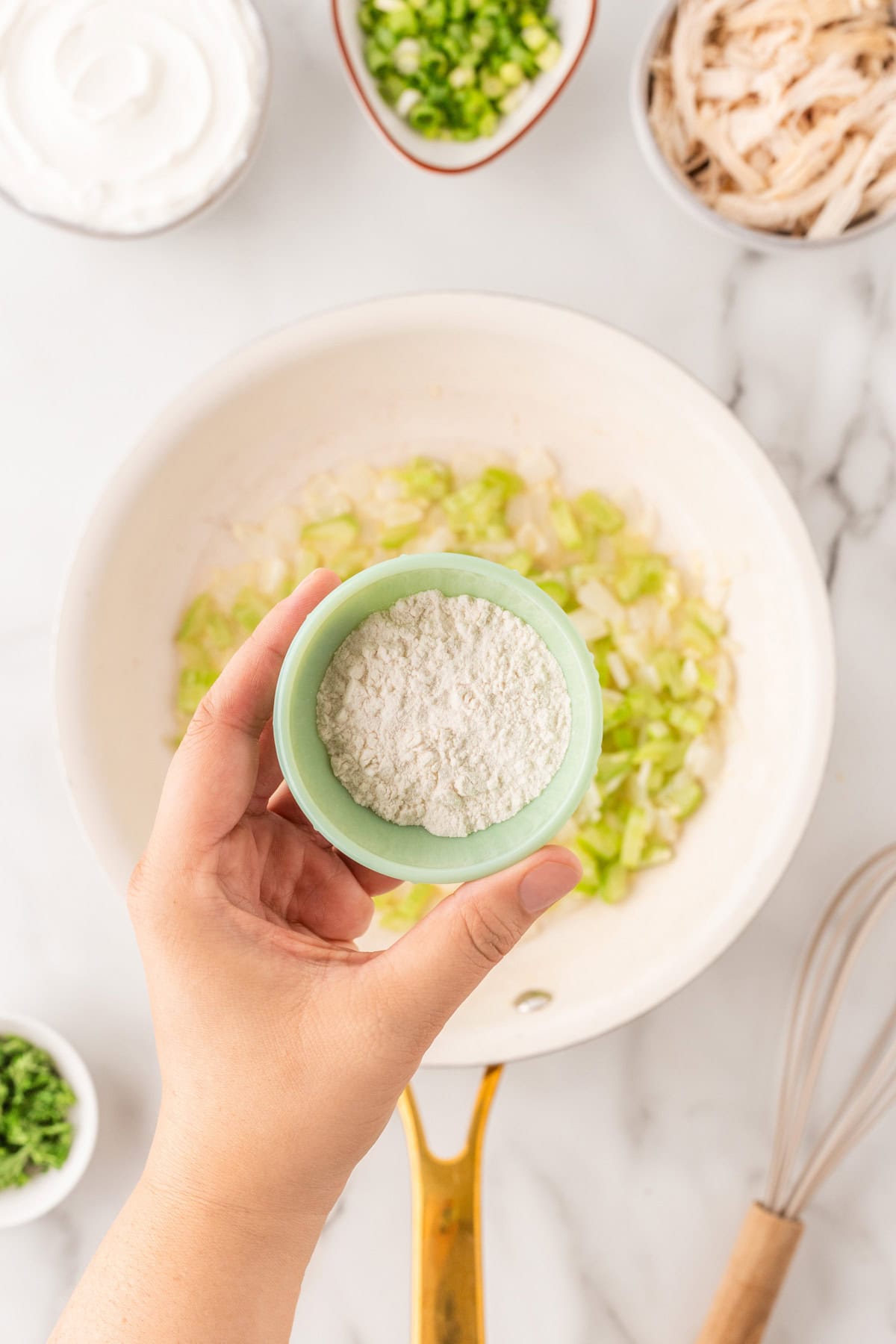 Adding in flour. 