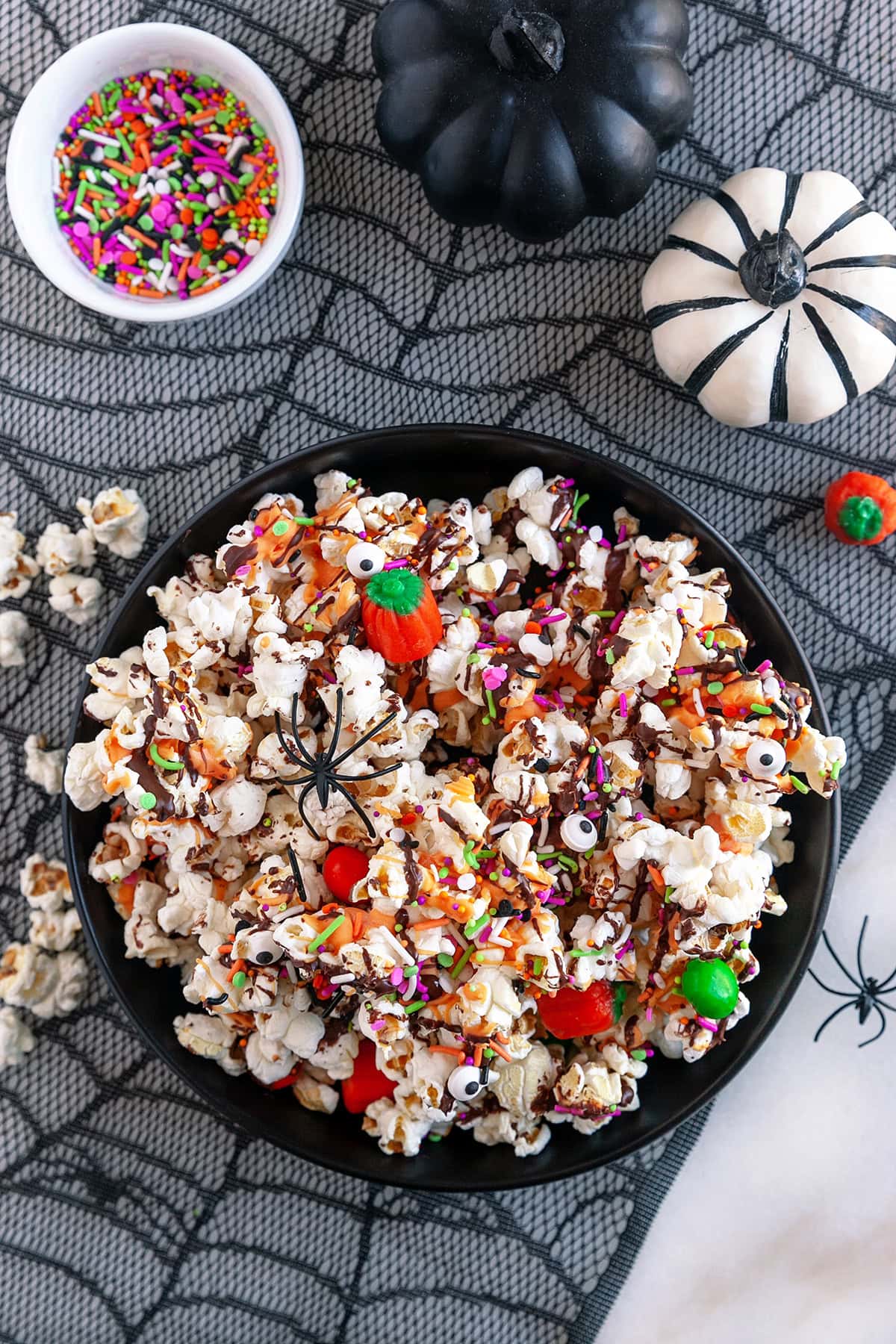 Large bowl filled with Halloween popcorn. 