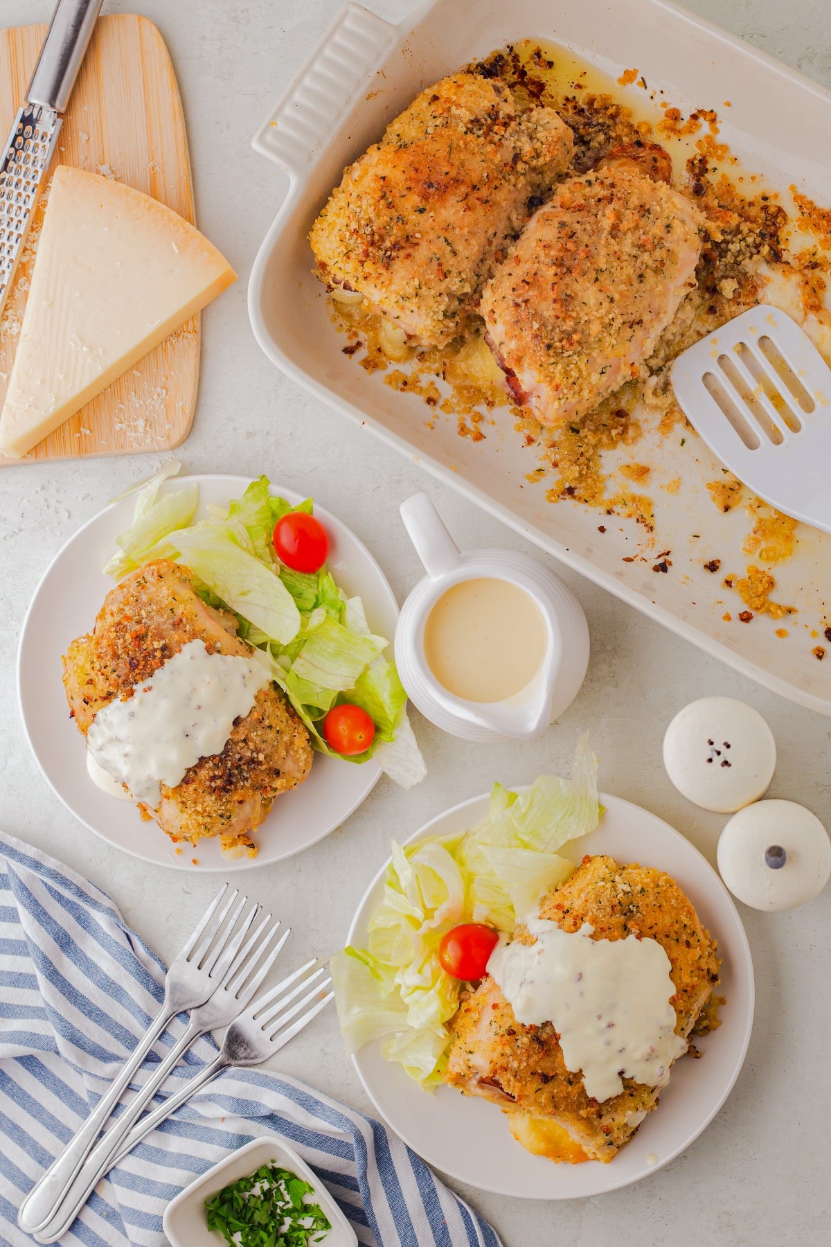 Plated Chicken Cordon Bleu with a simple salad.