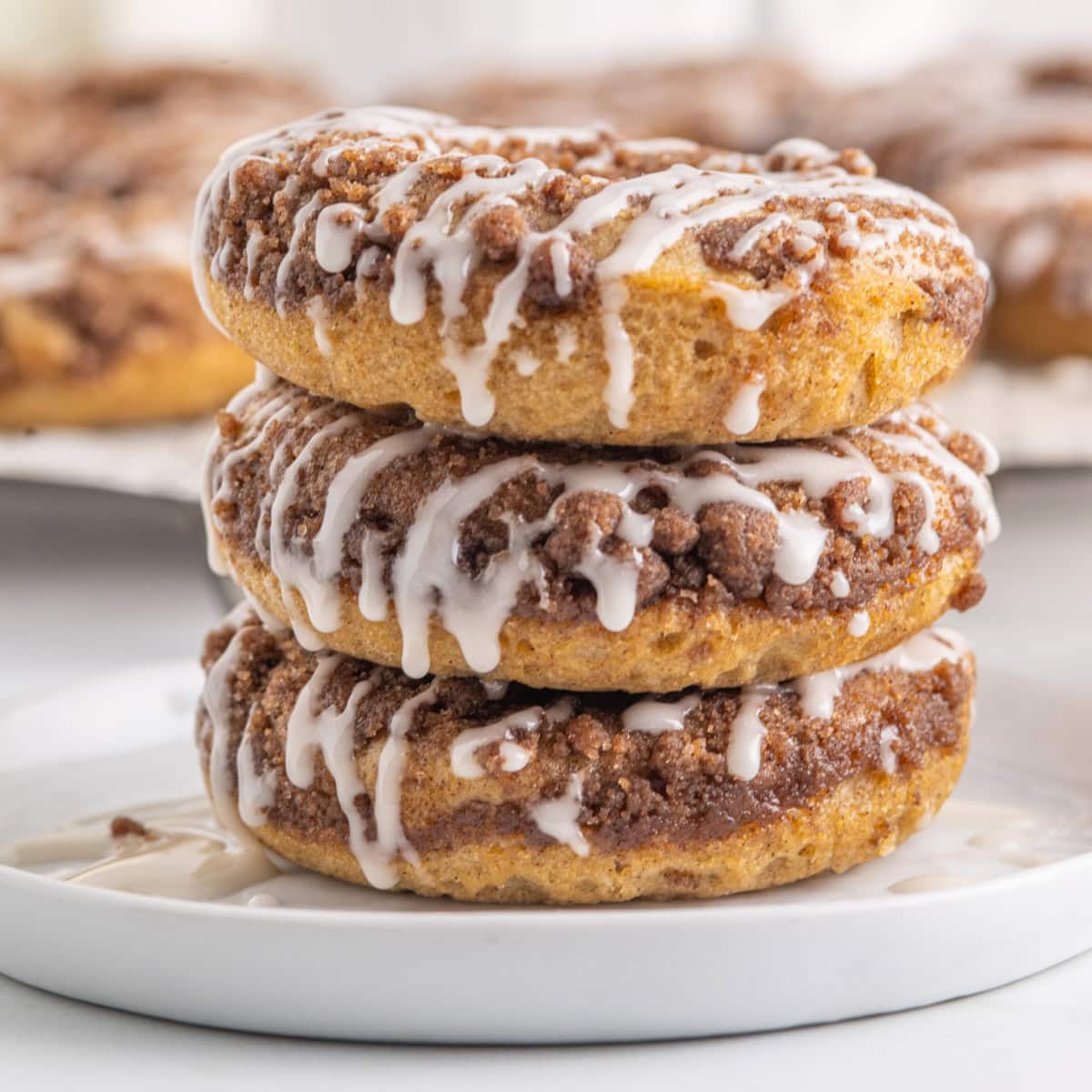 Square photo of stacked donuts. 