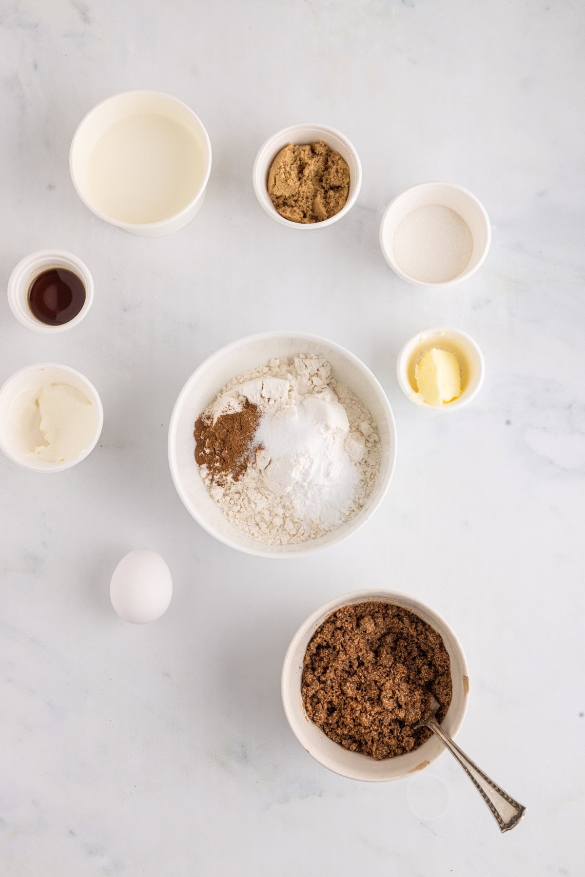 Dry ingredients added to a bowl. 