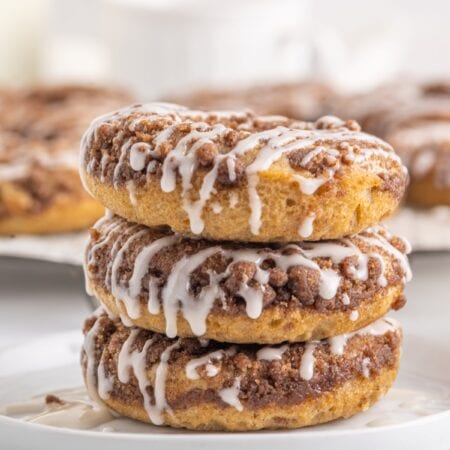 Three Cinnamon Donuts Stacked.