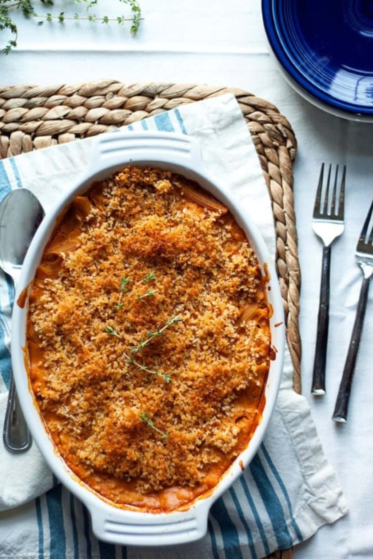 Uncut creamy butternut pasta bake in a casserole dish.