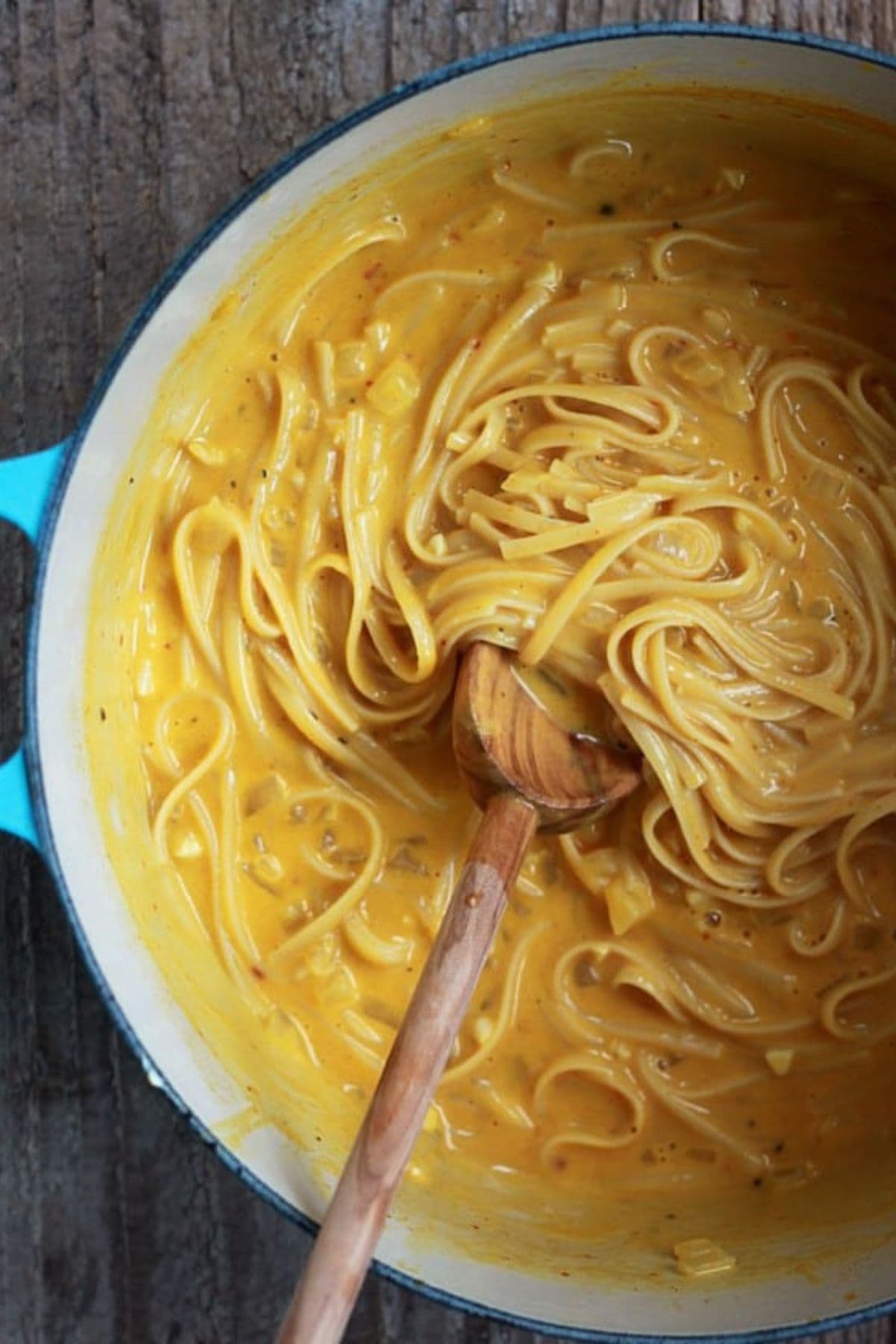 Creamy pumpkin pasta in a dutch oven.