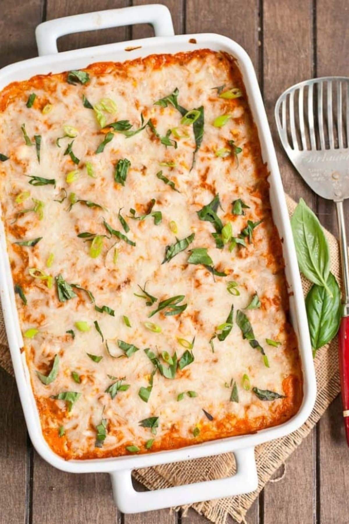 Uncut gournd beef company casserole in a baking dish on a table.