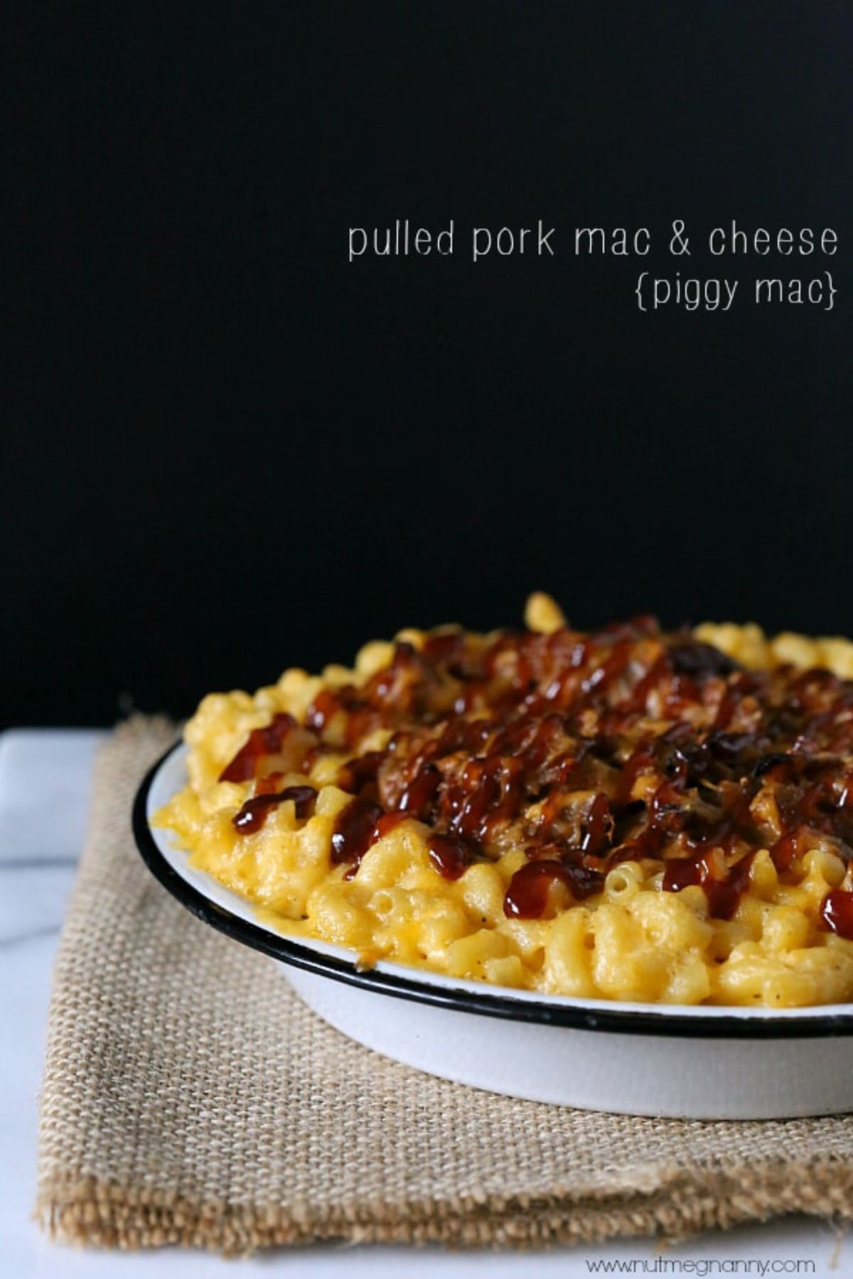 Bowl full of pulled pork mac and cheese.